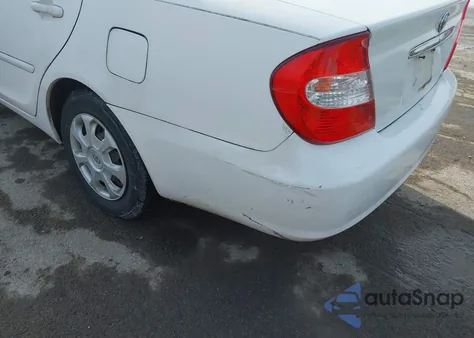 2003 Toyota Camry Le z USA, uszkodzony, nr VIN 4T1BE32K73U229830